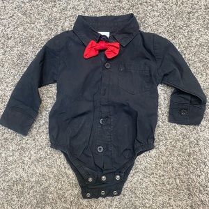 Black dress shirt with red bow tie